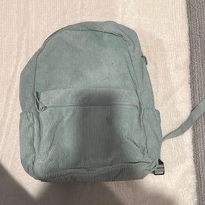 Backpack from wild fable selling for $14. Barley used. Blue corduroy color.